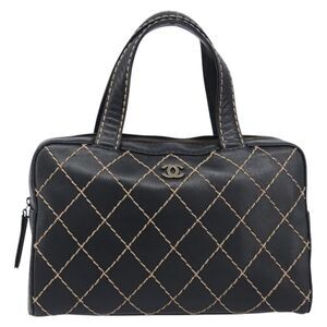 Chanel Surpique Boston Quilted Leather Black Leather Handbag